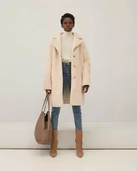 Шуба молочного цвета