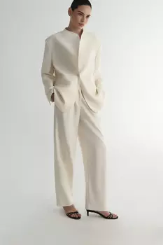 Брюки с заниженной талией молочного цвета