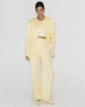 Брюки со льном желтого цвета
