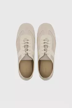Кеды на низкой подошве молочного цвета