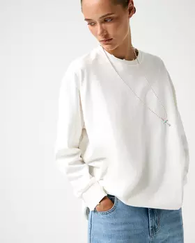 Лонгслив оверсайз молочного цвета