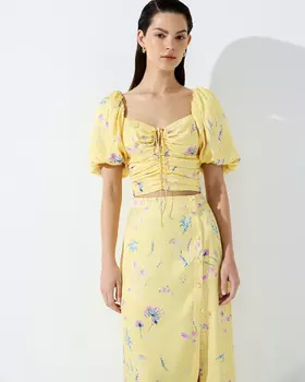 Топ с объемными рукавами желтого цвета