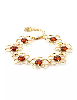 Ажурный браслет из цельного янтаря в серебре с позолотой «Ромашка»