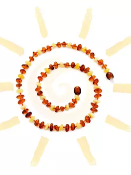 Детские бусы из натурального балтийского янтаря «Галька коньячно-медовая»