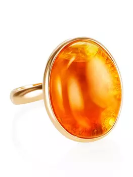 Яркое кольцо из натурального янтаря с красивой текстурой