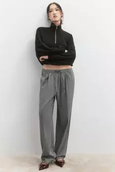 Брюки-бананы костюмные с поясом на завязках