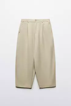 Брюки-бананы костюмные с резинкой на поясе