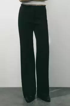 Брюки клеш с открытыми срезами и рваниной