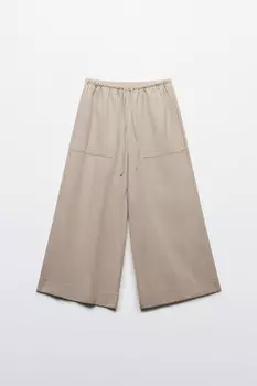 Брюки широкие с накладными карманами