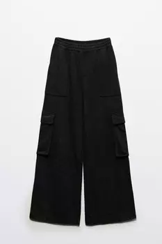 Брюки широкие трикотажные с накладными карманами