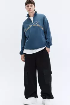 Брюки трикотажные широкие с накладными карманами