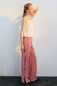 Брюки в клетку с разрезами и завязками