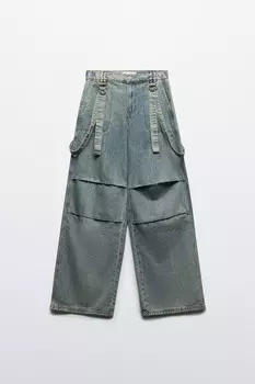 Джинсы baggy с разрезами и ремнями