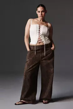 Джинсы baggy со змеиным принтом