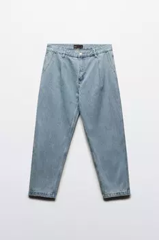 Джинсы-бананы широкие со складками на поясе