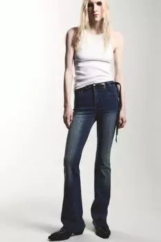 Джинсы flare расклешенные с открытыми срезами