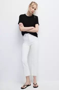 Джинсы клеш с открытыми срезами