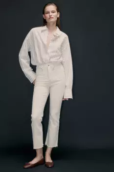 Джинсы клеш с открытыми срезами