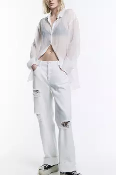 Джинсы loose fit рваные с потертостями
