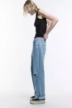 Джинсы loose fit рваные с потертостями
