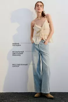 Джинсы широкие с фактурными цветами