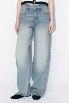 Джинсы широкие с открытыми срезами