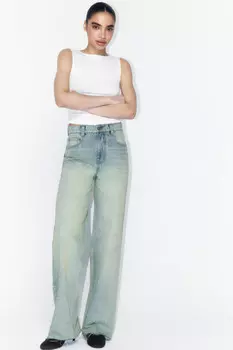 Джинсы широкие с открытыми срезами