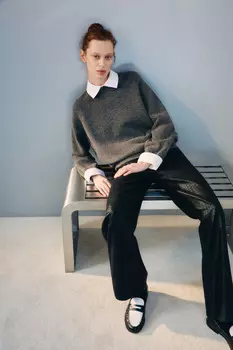 Джинсы широкие с покрытием под рептилию