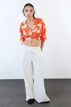 Джинсы широкие с поясом-резинкой на завязках