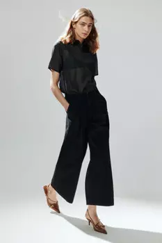 Джинсы широкие укороченные с бахромой