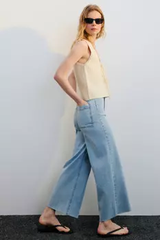 Джинсы широкие укороченные с открытыми срезами