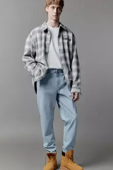 Джинсы tapered fit зауженные