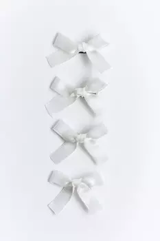 Набор заколок-зажимов с бантиками (4 штуки)