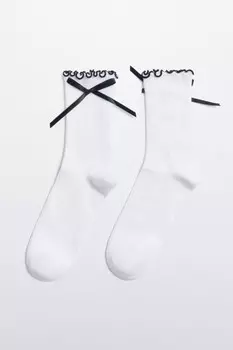 Носки с оборками и атласными бантиками