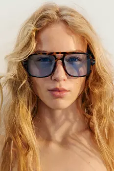 Очки солнцезащитные в леопардовой оправе