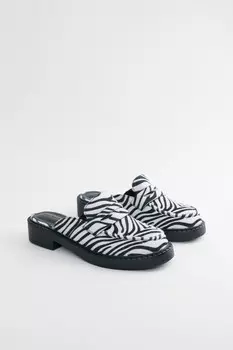 Туфли-лоферы с открытой пяткой и зебровым принтом