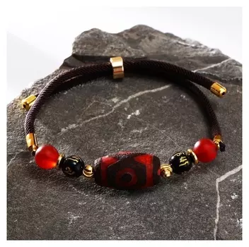 Браслет "Бусина Дзи" на шнурке, бочка, цвет чёрно-оранжевый, D=7см