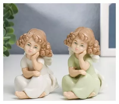 Сувенир керамика "Девочка с кудряшками, в платье с бантом" 9х4,5х5 см