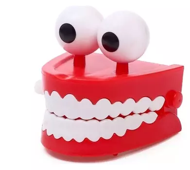 Заводная игрушка «Челюсти с глазами»