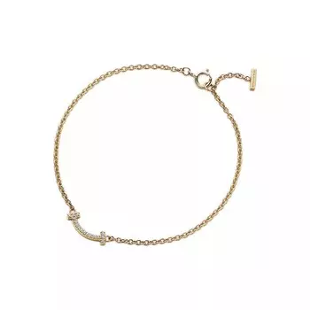 Браслет Tiffany & Co. T Smile, золото/бриллианты