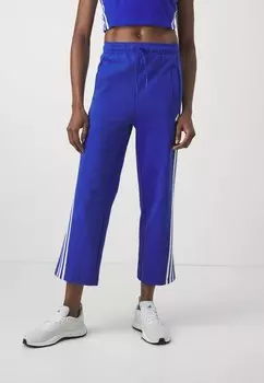 Брюки adidas Sportswear FUTURE ICONS THREE STRIPEES OPEN HEM, цвет semi lucid blue
