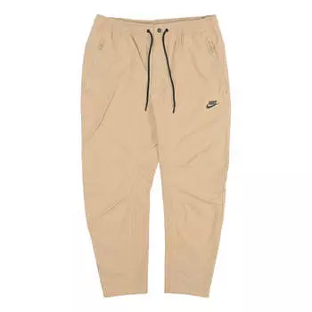 Брюки small logo pattern woven athleisure casual sports long pants khaki Nike, хаки