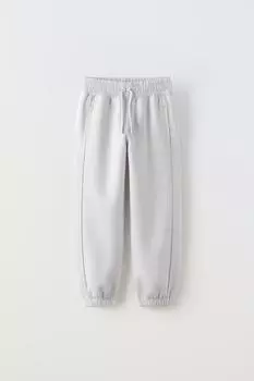 Джоггеры с блескающей отделкой ZARA, лед