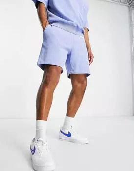 Голубые шорты с эффектом потертости ASOS DESIGN
