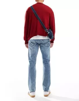 Голубые зауженные джинсы Levi's 502