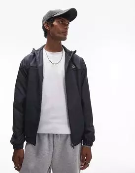 Куртка стеганая на молнии черного цвета Lacoste