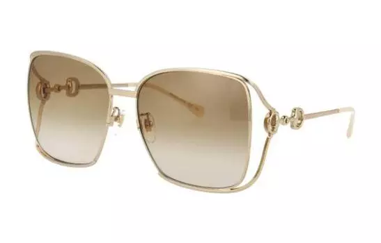 Очки солнцезащитные Gucci Unisex необычной формы, золотой