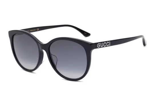 Очки солнцезащитные Gucci в овальной форме, черный