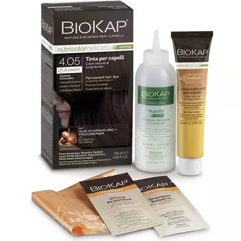 Перманентная краска для волос BIOKAP RAPID 4.05 Шоколадно-каштановый коричневый Время реакции 10 минут Органическое аргановое масло Комплекс TricoREPAIR Веганский Оптимальное закрашивание седины До 80% натуральных ингредиентов