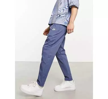 Синие тканые зауженные брюки Nike Club